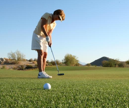 Many golf shoes have soft rubber spikes to prevent the player from sliding.